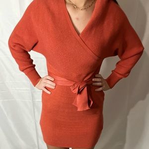Super cute dolman style sweater dress!  The color is more of a burnt orange.
